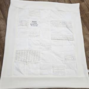 Wedding dress made into patchwork blanket