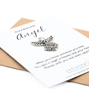 Guardian Angel Token with a message and envelope.